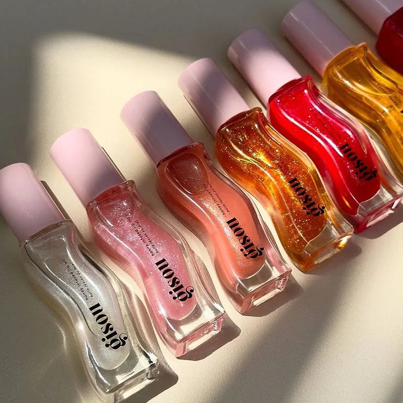 Gisou Moisturizing Glazed Plum Lip Balm Lip Oil Gloss Care Of The Lips Benetitnt For Lips Plumping Exfoliating Plumping Gloss